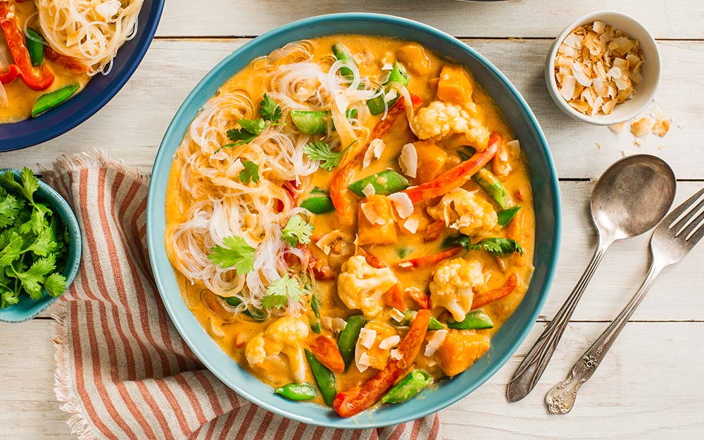Coconut Red Curry Noodles with snap peas, cauliflower and sweet peppers,
