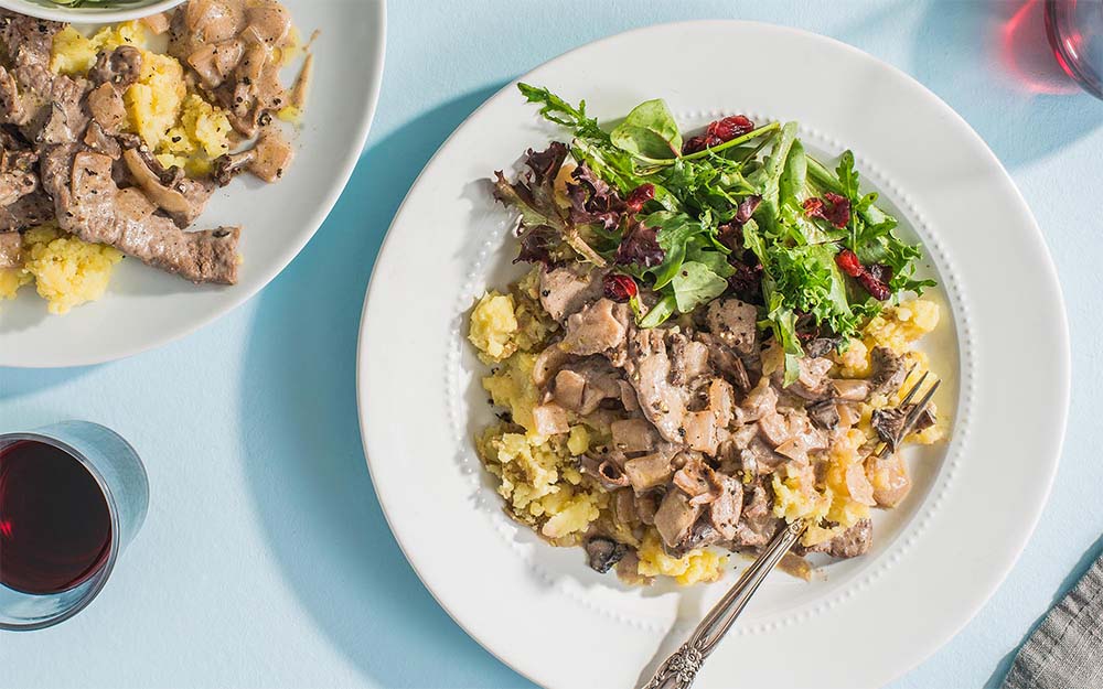 Easy Beef Stroganoff with a rustic potato mash and mushroom gravy,
