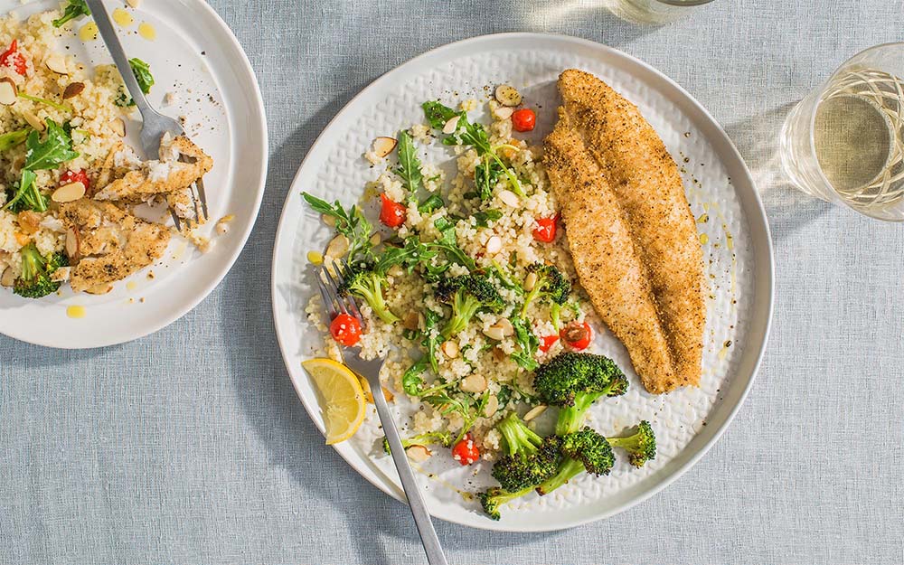 Sumac Spiced Fish & Lemon Roasted Broccoli with couscous and sweet drop peppers,