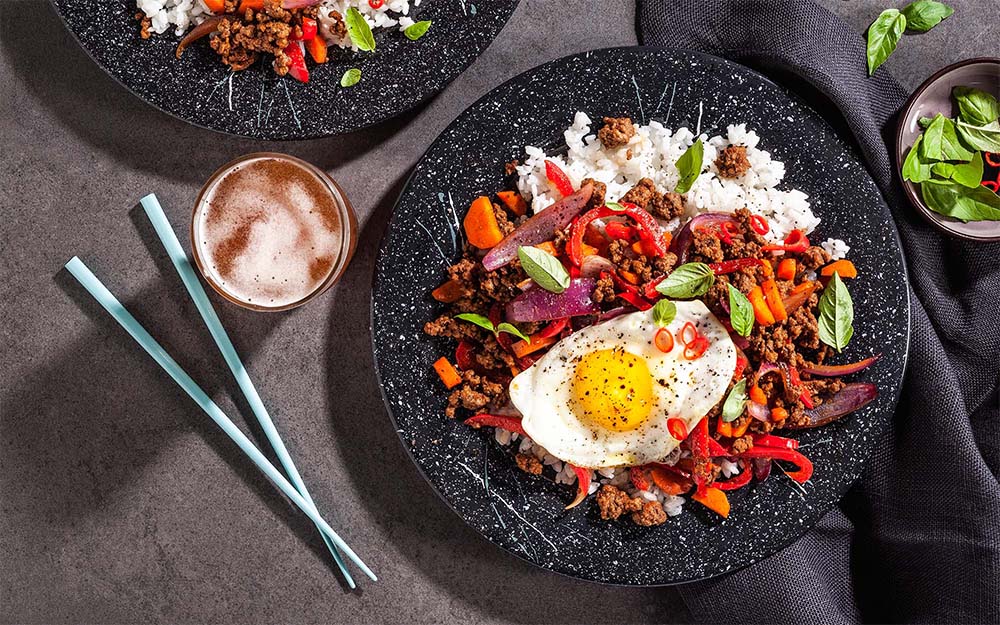 Beef Pad Gra Prow with Thai basil, sweet chili sauce and sticky rice,