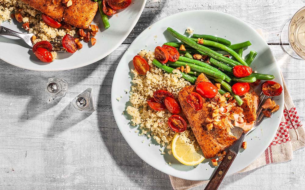Salmon with Almond Brown Butter over herbed couscous with garlic beans,