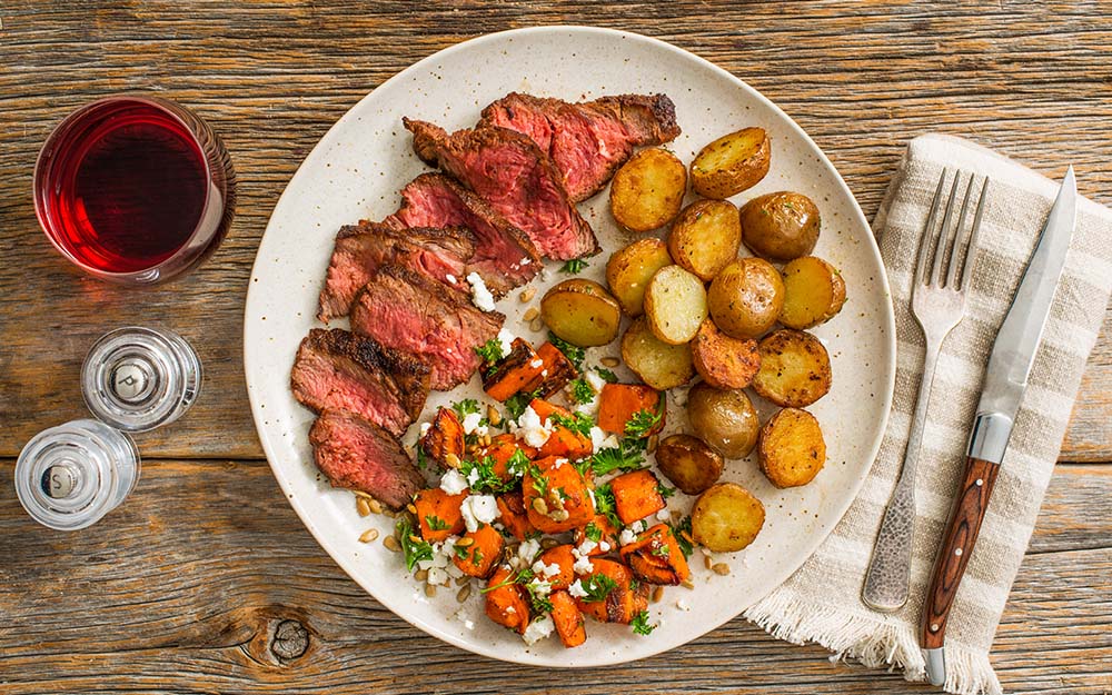 Middle Eastern Rubbed Steak with honey-lime carrots and roasted baby potatoes,